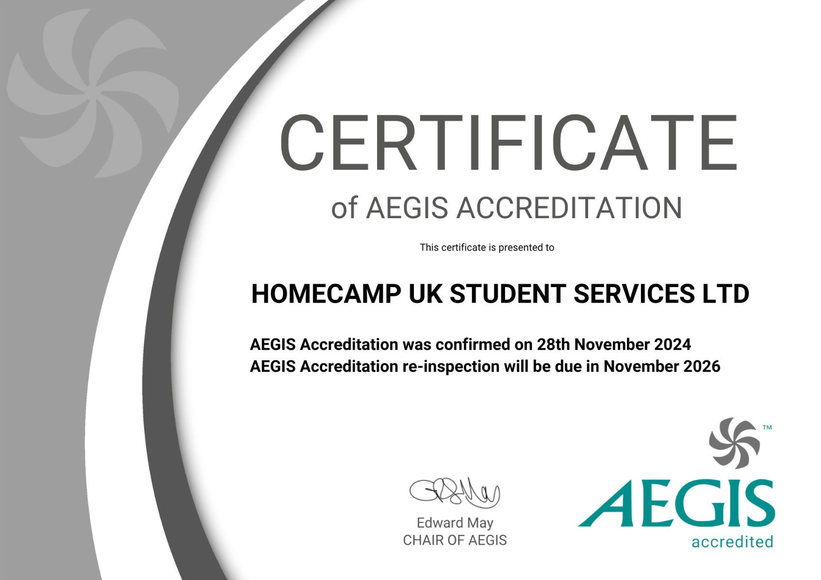 AEGIS logo. Homecamp is accredited by AEGIS.